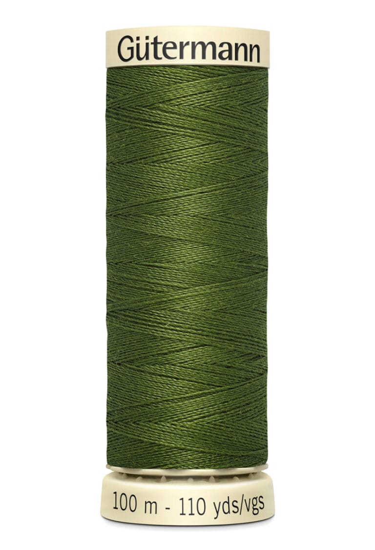 A spool of Gütermann sewing thread in dark green, labeled with 100 meters - 110 yards. The spool is cylindrical with a cream-colored top and bottom.