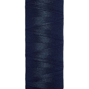 A spool of Gütermann dark blue sewing thread. The spool holds 100 meters or 110 yards of thread, with a beige label on top and bottom displaying the brand name and length information.