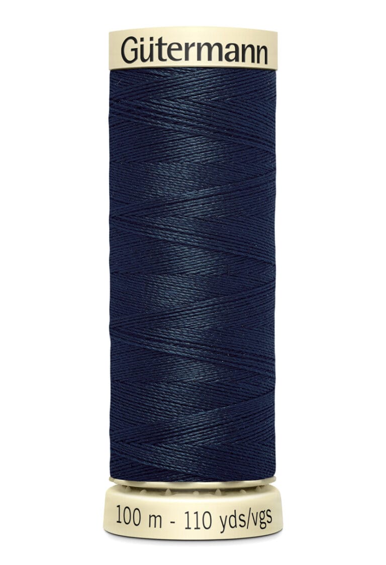 A spool of Gütermann dark blue sewing thread. The spool holds 100 meters or 110 yards of thread, with a beige label on top and bottom displaying the brand name and length information.