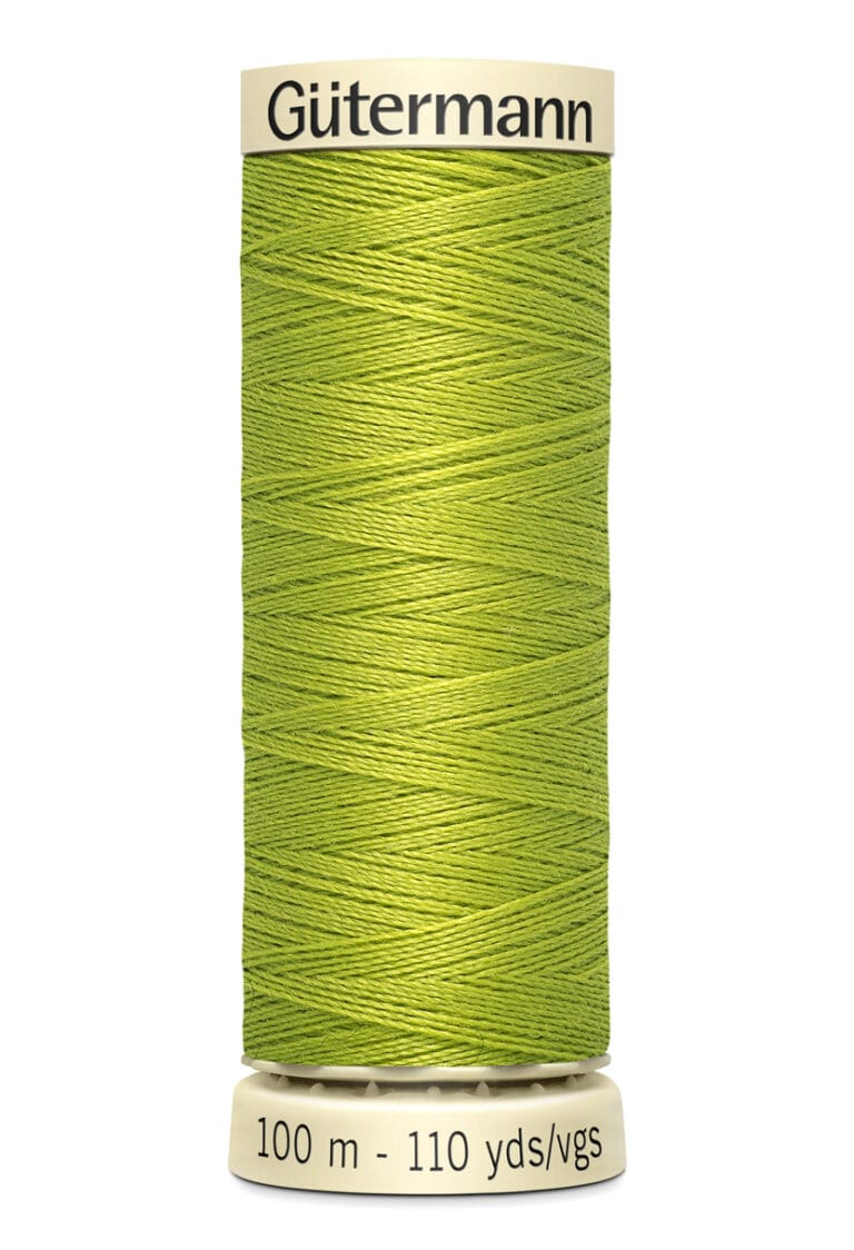 A spool of Gütermann sewing thread in bright green, labeled with "100 m - 110 yds/vgs." The spool has a cream-colored top and bottom, and the thread is tightly wound.