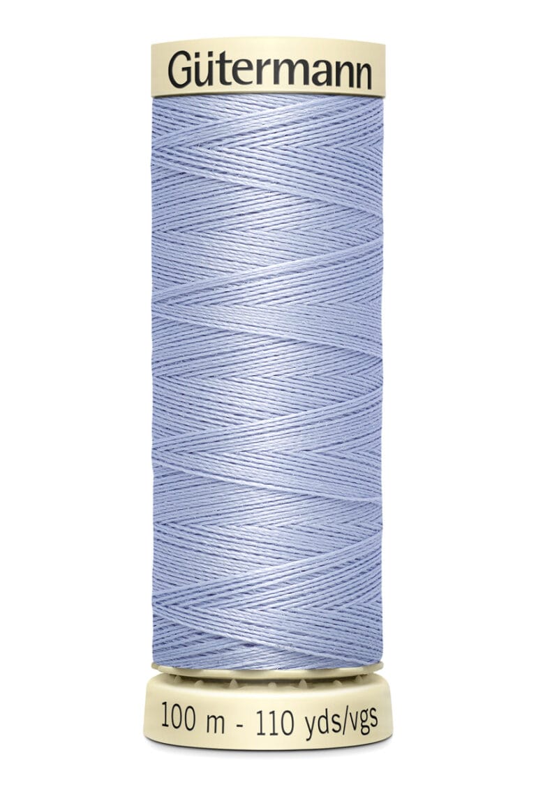 A spool of Gutermann thread in light blue, wrapped around a beige spool. The label shows "100 m - 110 yds/vgs" at the bottom.