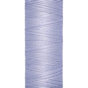 A spool of Gütermann sewing thread in light purple. The label indicates the length is 100 meters or 110 yards. The spool is cylindrical with beige ends, and the thread is neatly wound around it.