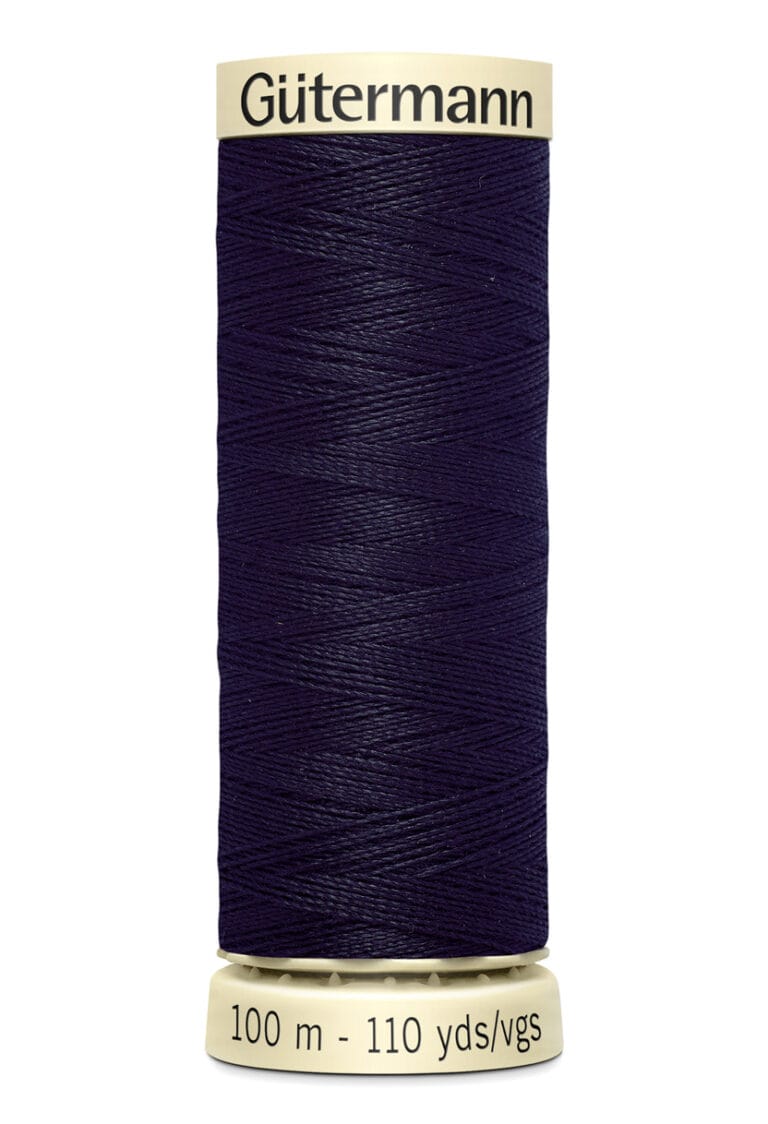 A spool of Gütermann thread showing a deep navy blue color. The label on the spool base reads "100 m - 110 yds/vgs." The brand name is displayed at the top of the spool.