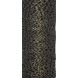 A spool of Gütermann thread in a dark shade, with visible strands neatly wound. The spool's label at the bottom indicates it contains 100 meters or 110 yards of thread.
