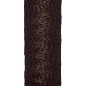A spool of Gütermann sewing thread in dark brown color. The spool label indicates 100 meters (110 yards). The thread is tightly wound around a cream-colored cylindrical spool with black text.