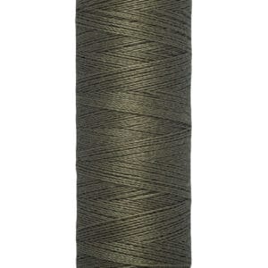 A spool of Gütermann thread in dark olive green color. The label indicates it contains 100 meters or 110 yards of thread.