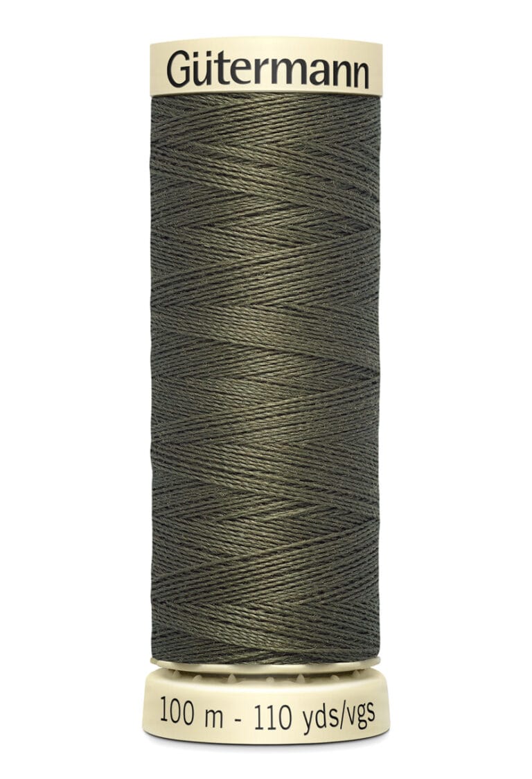 A spool of Gütermann thread in dark olive green color. The label indicates it contains 100 meters or 110 yards of thread.