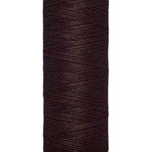 Spool of Gütermann sewing thread in dark brown, wrapped around a light beige plastic reel, labeled "100 m - 110 yds/vgs.