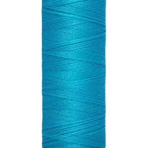 Spool of Gütermann thread in vibrant turquoise color, labeled with a length of 100 meters or 110 yards. The spool has a cream-colored top and base.