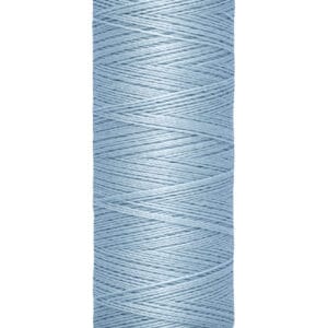 Spool of Gütermann thread in light blue. The label displays length: 100 meters or 110 yards.