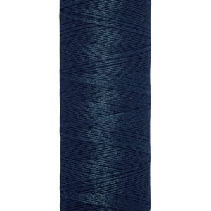 A spool of Gütermann dark blue sewing thread with a beige top and bottom. The label reads "100 m - 110 yds.