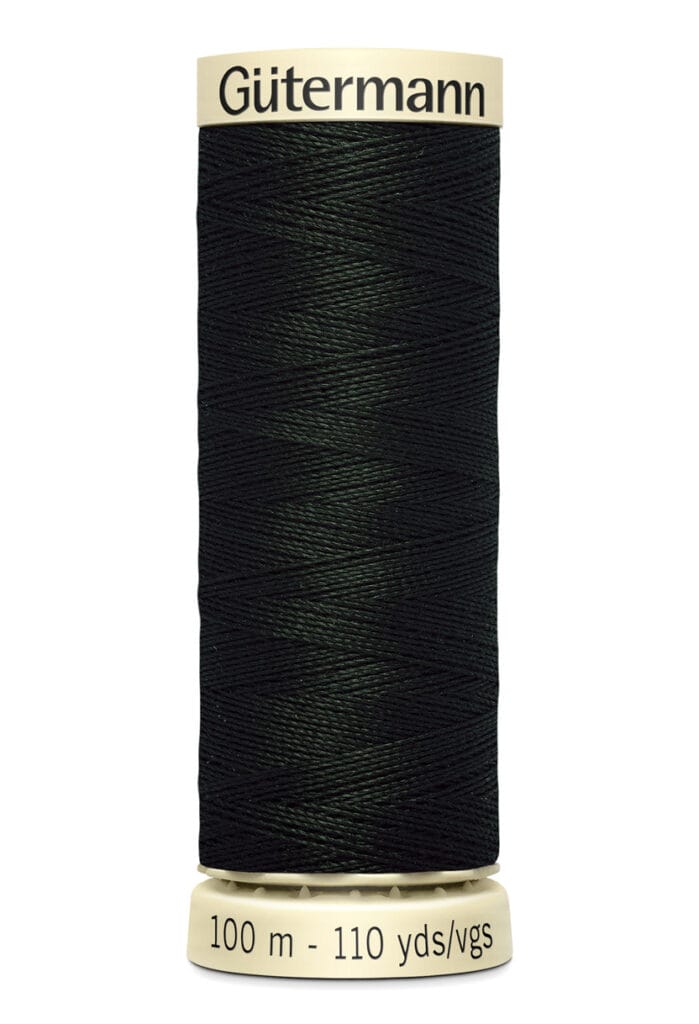 A spool of Gütermann sewing thread in dark green. The spool is labeled with 100 meters and 110 yards on the bottom.