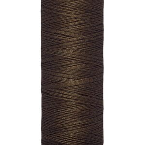 A spool of Gütermann brown thread, with 100 meters or 110 yards labeled on the base, designed for sewing. The spool is upright, displaying tightly wound thread against a white background.