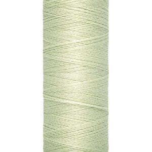 A spool of Gütermann sewing thread in a pastel green color. The spool indicates it contains 100 meters (110 yards) of thread.
