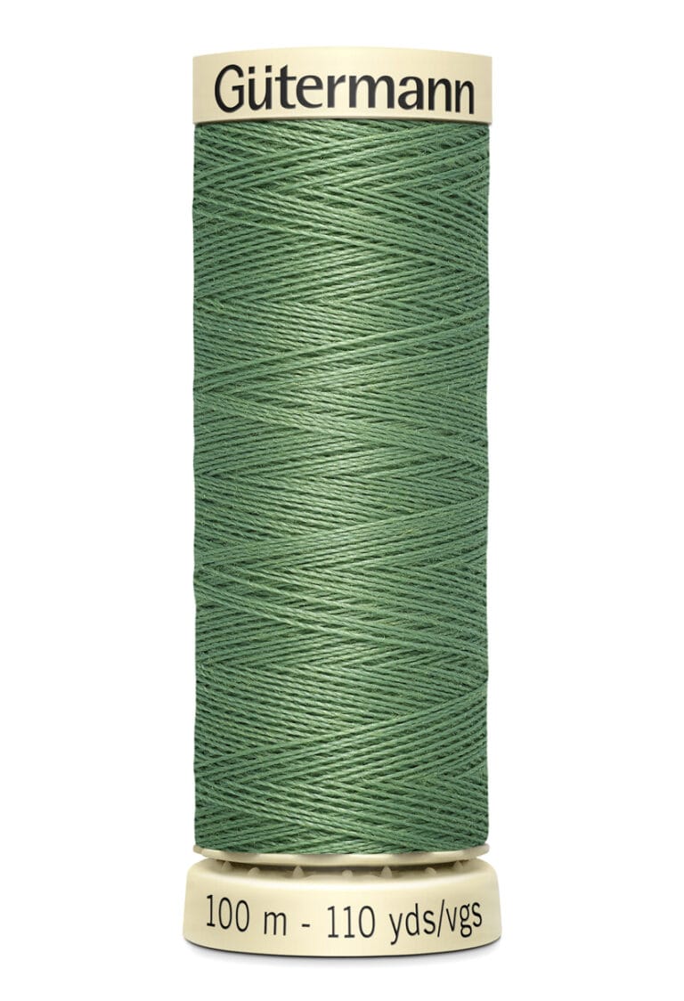 A spool of Gütermann sewing thread in a muted green color is shown. The spool is vertically oriented, with a label indicating it contains 100 meters (110 yards) of thread.