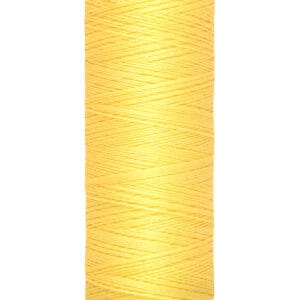 Yellow spool of Gütermann thread with 100 meters or 110 yards of thread.
