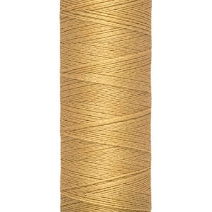 A spool of Gütermann thread in light brown color, with the label showing 100 meters (110 yards). The spool is cylindrical with cream-colored ends.