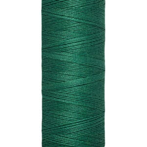 A spool of Gütermann sewing thread in deep green, wound around a beige cylindrical holder. The label reads "Gütermann" at the top and "100 m - 110 yds/vgs" at the bottom.