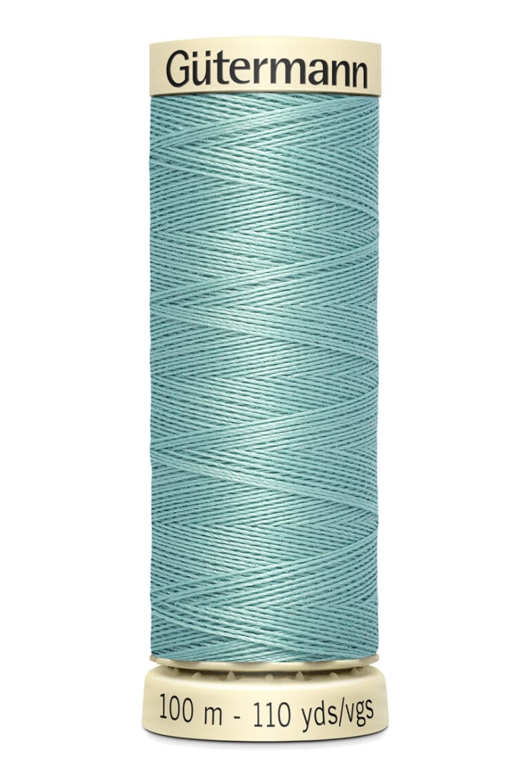 A spool of Gütermann sewing thread in light teal color, labeled with "100 m - 110 yds/vgs" on the bottom and "Gütermann" on the top, against a white background.