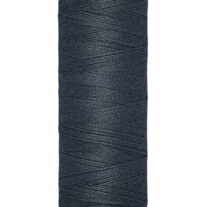 A spool of Gütermann sewing thread, dark blue in color, labeled with "100 m - 110 yds/vgs" at the bottom.