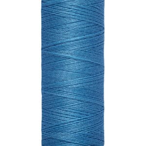 Spool of Gütermann thread in blue. The label indicates it is 100 meters or 110 yards long.