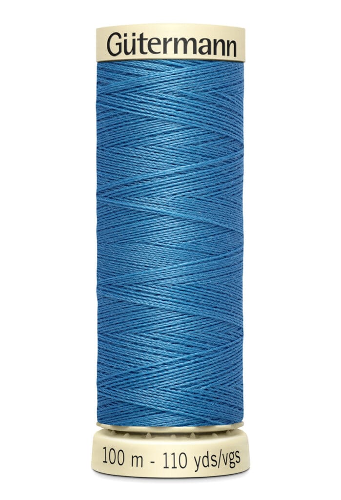 Spool of Gütermann thread in blue. The label indicates it is 100 meters or 110 yards long.
