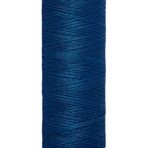 A spool of Gütermann sewing thread in a deep blue color. The label on the top displays the brand name, and the bottom indicates a length of 100 meters or 110 yards.