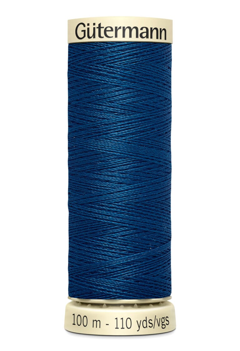 A spool of Gütermann sewing thread in a deep blue color. The label on the top displays the brand name, and the bottom indicates a length of 100 meters or 110 yards.