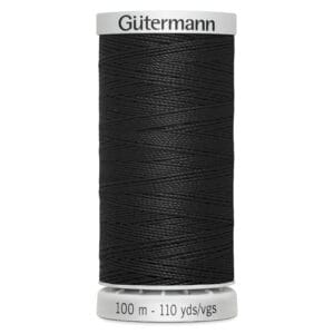 A spool of Gütermann black sewing thread, labeled with a length of 100 meters or 110 yards. The thread is neatly wound around the bobbin, and the brand name is printed on top.