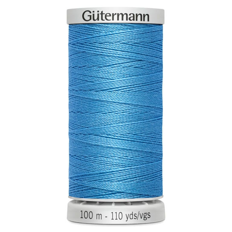 A spool of Gütermann sewing thread in bright blue, showing its tightly wound texture. The spool is labeled with "100 m - 110 yds/vgs" and features a white top and base.