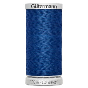 A spool of Gütermann blue sewing thread is shown. The spool label indicates it contains 100 meters or 110 yards of thread.