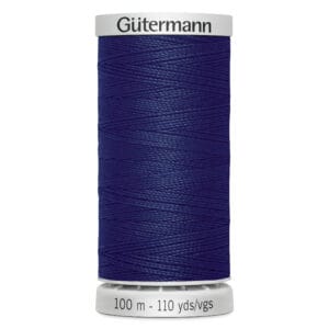 A spool of Gütermann thread in dark blue color. The label at the bottom indicates the length as 100 meters or 110 yards. The spool is cylindrical with a white top and bottom.