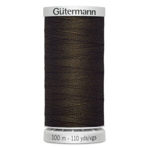 Spool of Gütermann dark brown sewing thread, labeled 100 meters/110 yards, against a white background.