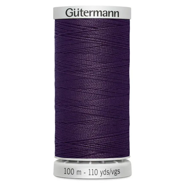 A spool of Gütermann thread in dark purple color. The label shows the length as 100 meters or 110 yards. The spool has a white top and base, with the brand name printed on the top.