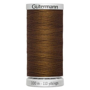 A spool of Gütermann thread in a rich brown color, labeled 100 meters/110 yards. The spool is upright and cylindrical, with the brand name at the top, and the length indication at the bottom.