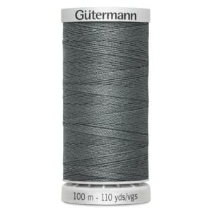 A spool of Gütermann sewing thread in a dark gray color. The spool is labeled to contain 100 meters or 110 yards of thread.