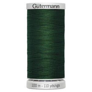 A spool of Gütermann thread, featuring dark green polyester thread. The label indicates a length of 100 meters or 110 yards.