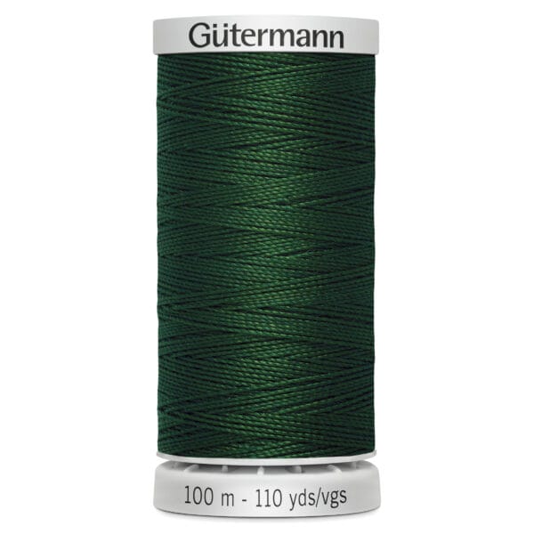 A spool of Gütermann thread, featuring dark green polyester thread. The label indicates a length of 100 meters or 110 yards.