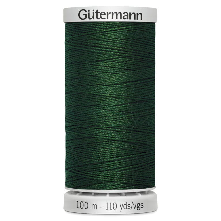 A spool of Gütermann thread, featuring dark green polyester thread. The label indicates a length of 100 meters or 110 yards.