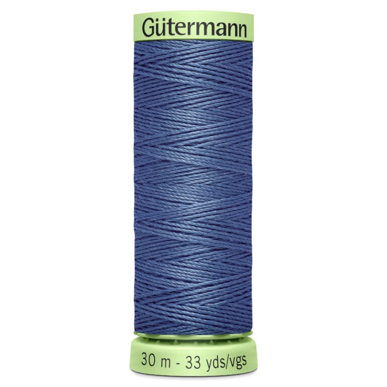 Spool of Gütermann blue sewing thread with a green label on top and bottom, indicating 30 meters or 33 yards.