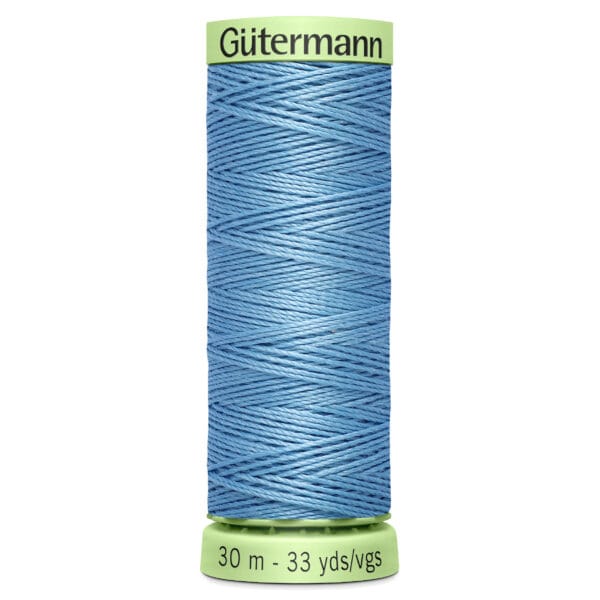 A spool of Gütermann blue thread is shown, featuring 30 meters or 33 yards of thread. The spool has green ends with the brand name displayed at the top.
