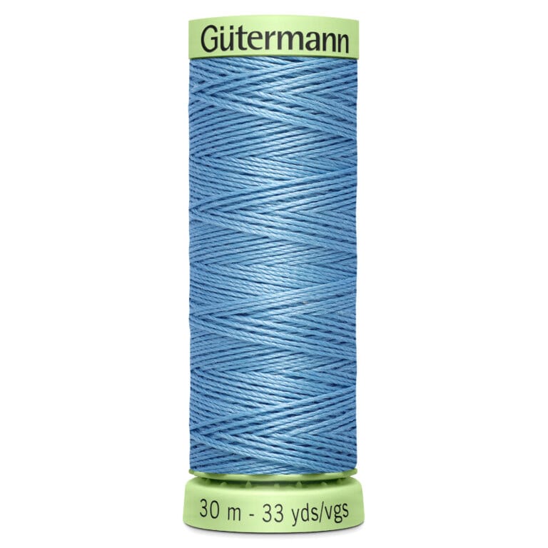 A spool of Gütermann blue thread is shown, featuring 30 meters or 33 yards of thread. The spool has green ends with the brand name displayed at the top.