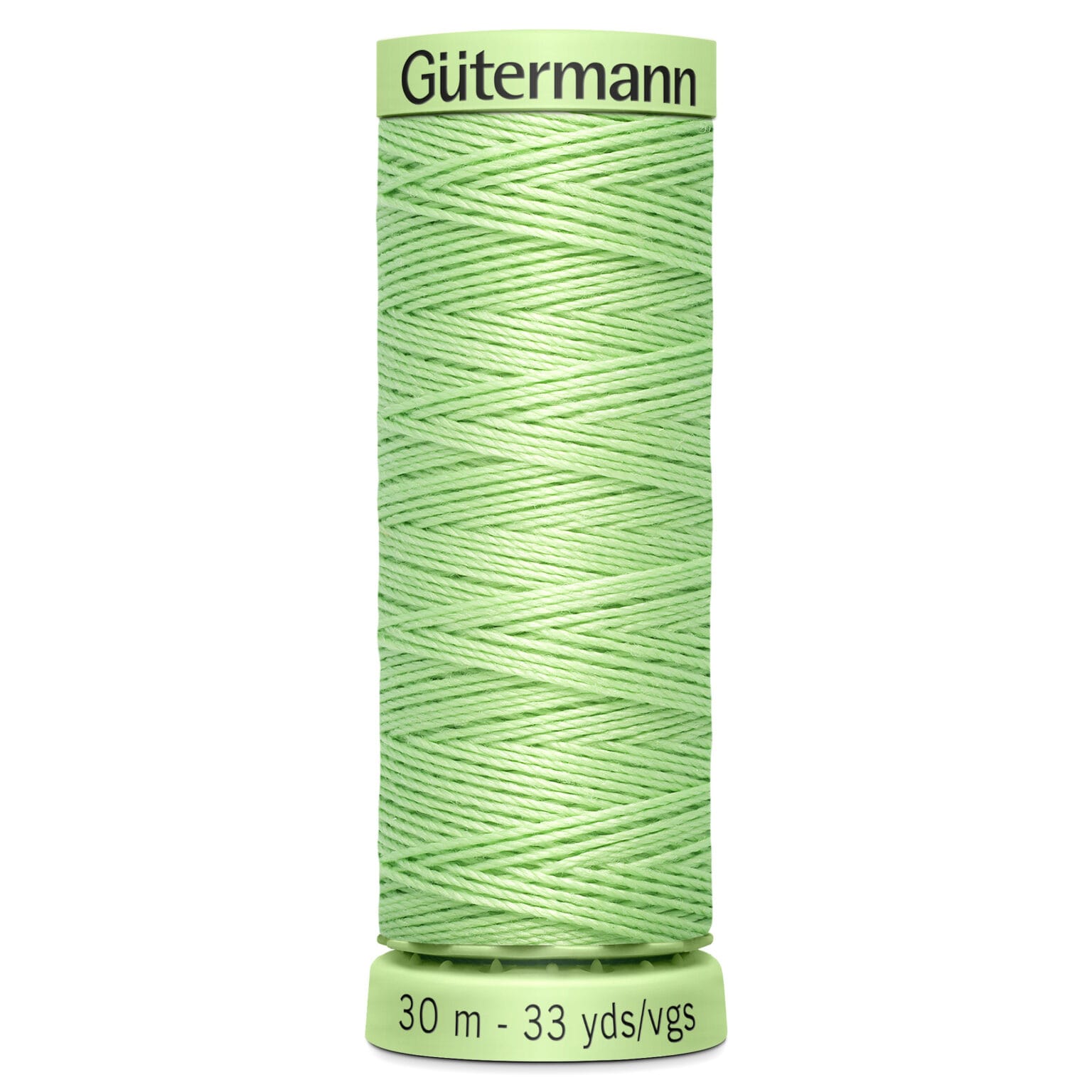 A spool of Gütermann sewing thread in light green, labeled with "30 m - 33 yds/vgs" on the bottom. The thread is tightly wound in a crisscross pattern around the spool.