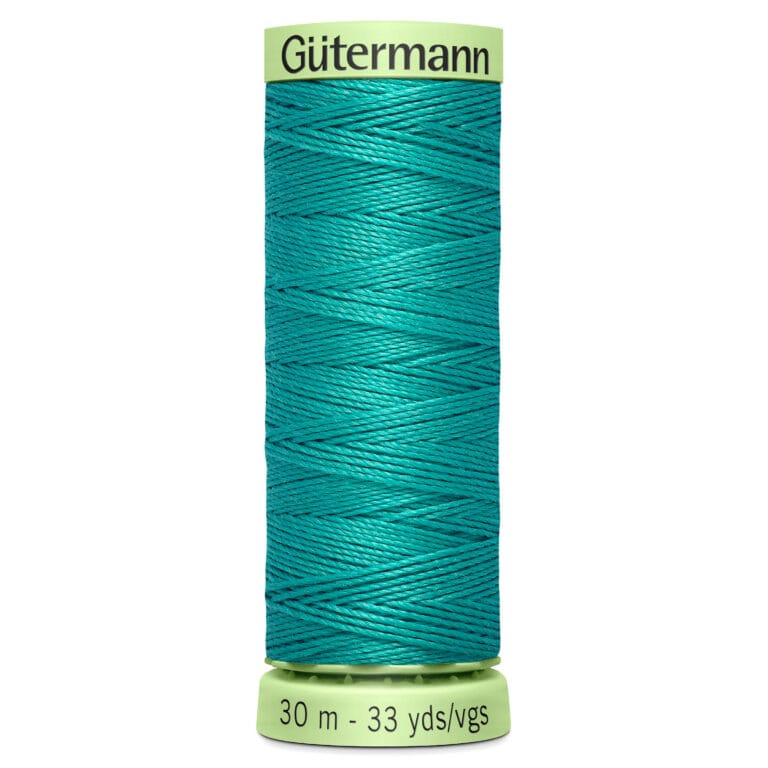 A spool of Gütermann sewing thread in a bright teal color, labeled with 30 meters (33 yards) on the bottom. The thread is neatly wound around the spool.