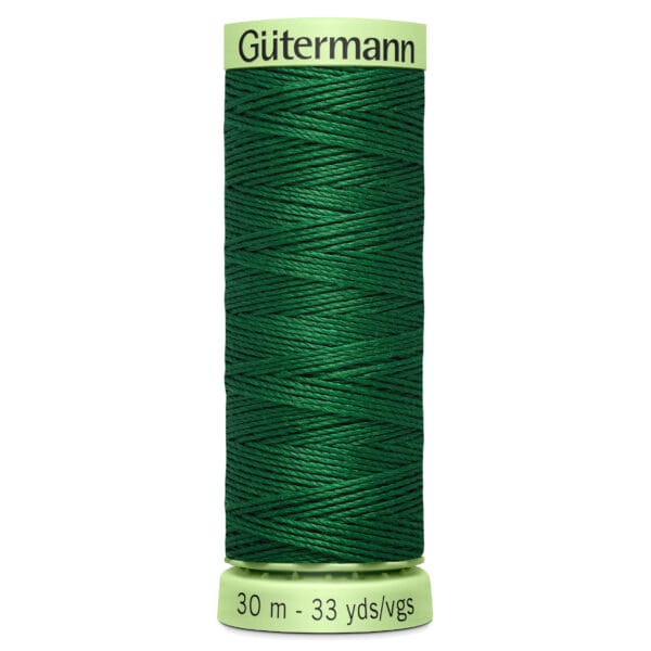 Spool of Gütermann thread in dark green, labeled with "30 m - 33 yds/vgs" at the base.