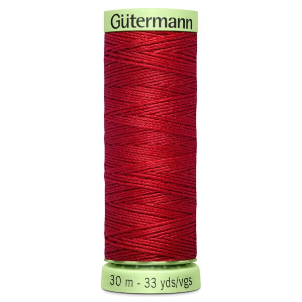 A spool of Gütermann thread in deep red, measuring 30 meters or 33 yards. The spool is green with black text indicating the brand and length.