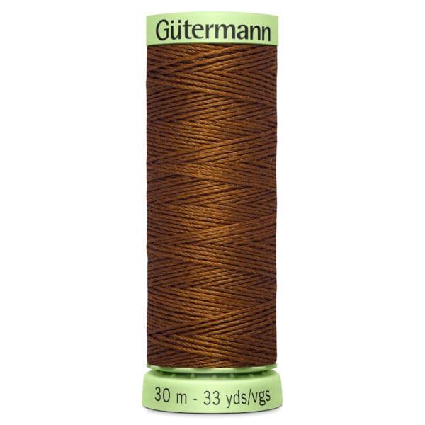 Brown spool of Gütermann thread, labeled "30 m - 33 yds/vgs" on a lime green base.