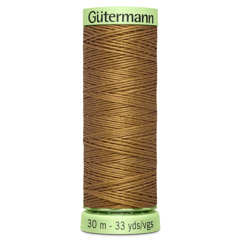 A spool of Gutermann brown thread is vertically positioned against a white background. The spool is labeled with "30 m - 33 yds/vgs" on a green base and the brand name in green on top.