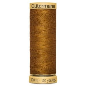 Spool of Gütermann thread, 100 meters, 110 yards, in a rich brown color. The thread is wound neatly around the spool, which is labeled with brand and length information.
