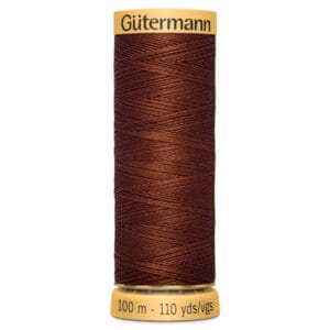 A spool of Gütermann thread in deep brown color. The spool is cylindrical, with yellow ends, and states "100 m - 110 yds/vgs" in black text at the bottom.